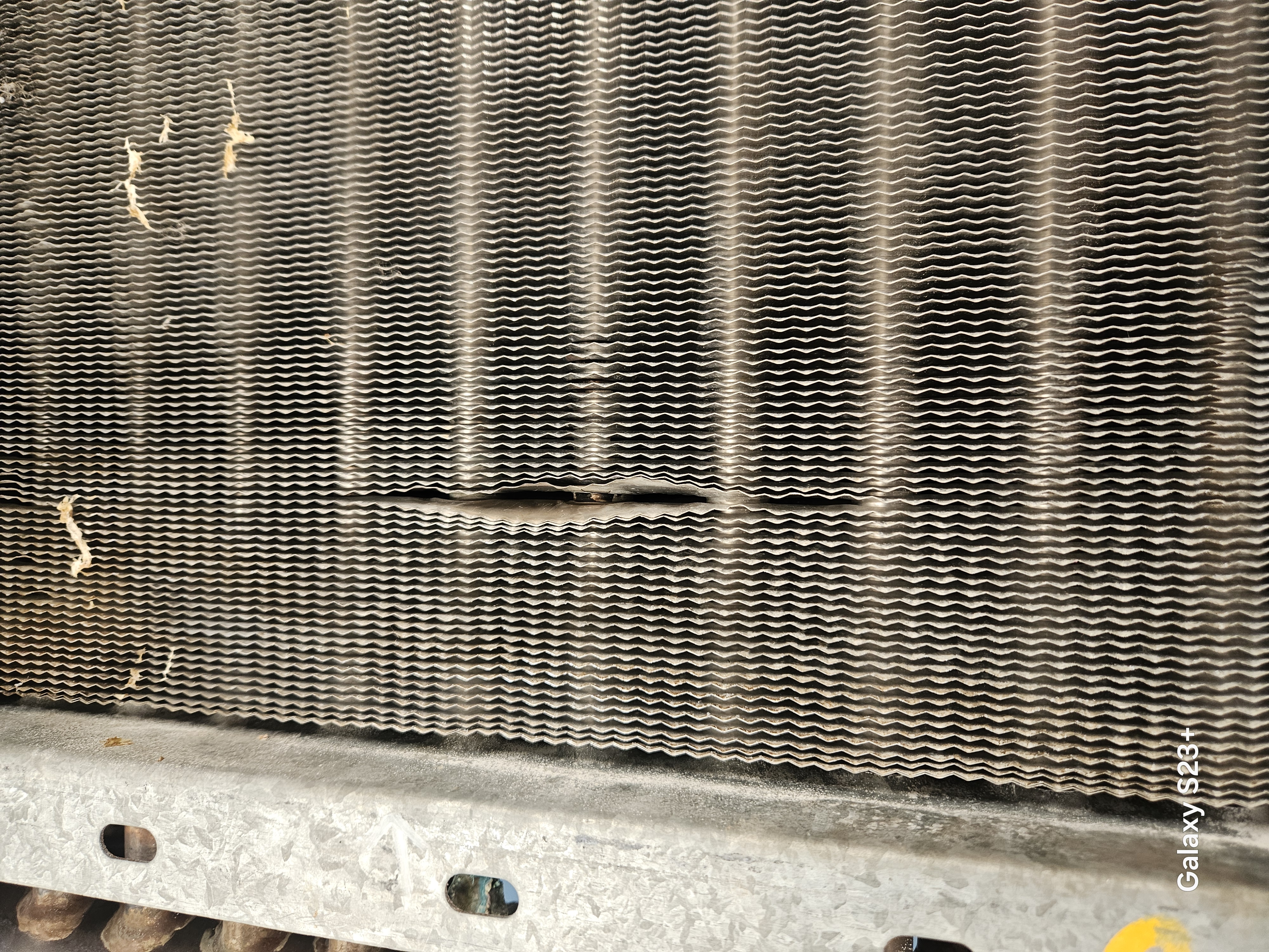 Failed previous repair on an industrial coil header