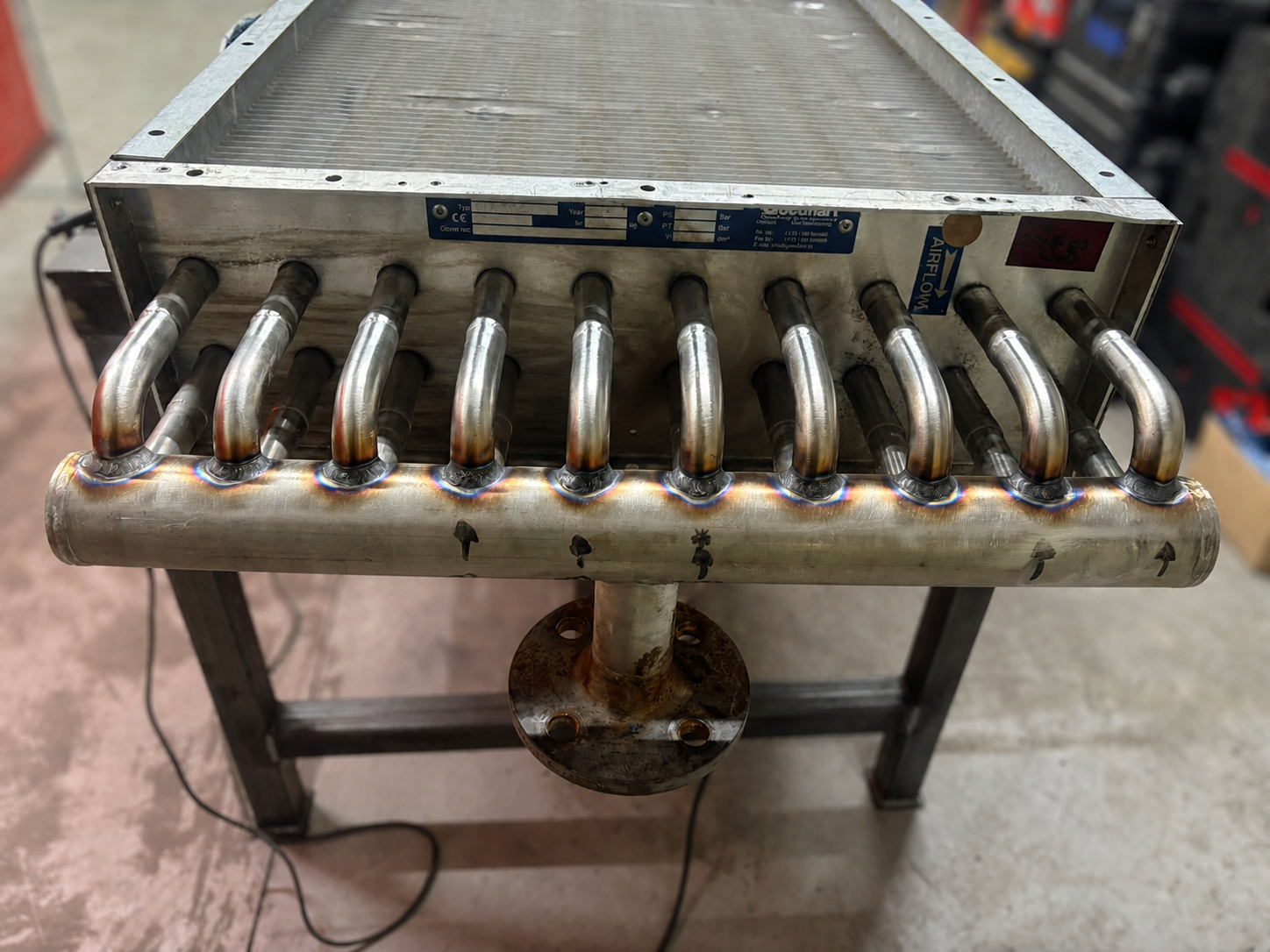 Completed repaired industrial coil header and tube connections